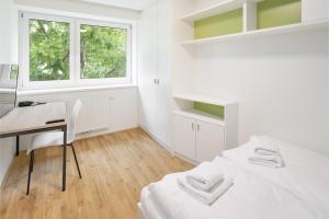Krevet ili kreveti u jedinici u okviru objekta myNext - Hotel Leo