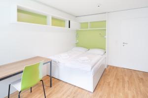 Krevet ili kreveti u jedinici u okviru objekta myNext - Hotel Leo
