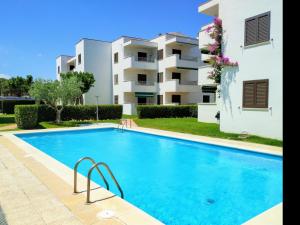 Bazén v ubytovaní VACAY Apartamento Fanny, a pie de playa, en la Costa brava, L'Escala! alebo v jeho blízkosti