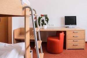 Ένα ή περισσότερα κρεβάτια σε δωμάτιο στο Hotel Veter