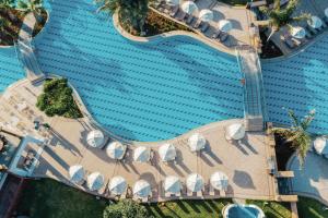 an overhead view of a swimming pool at a resort at Lindos Imperial Resort & Spa in Kiotari