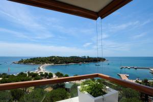 a view of the ocean from a balcony at Maistra Select All Suite Island Hotel Istra in Rovinj