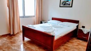 Postel nebo postele na pokoji v ubytování The First Hotel Saranda