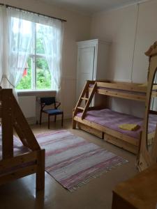 Postel nebo postele na pokoji v ubytování Lysekil-Brastad
