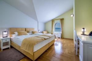 Hotel Domino客房内的一张或多张床位