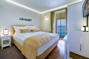 Hotel Domino客房内的一张或多张床位