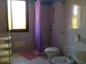 Koupelna v ubytování Agriturismo Sa Murta in Sennariolo-Oristano
