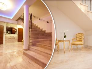 a spiral staircase in a living room with a mirror at Hotelik Amber REALIZUJEMY BON TURYSTYCZNY in Raszyn