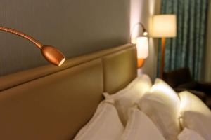 Cama ou camas em um quarto em Vogal Luxury Beach Hotel & SPA