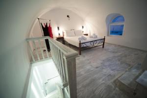 Ένα ή περισσότερα κρεβάτια σε δωμάτιο στο Villa Galaxy Santorini