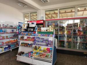 a store filled with lots of products in a store at Diva Kompani Rooms in Berovo