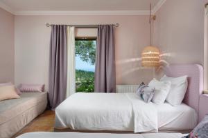 Cama ou camas em um quarto em Artblue Villas
