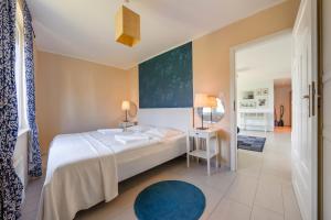 Ένα ή περισσότερα κρεβάτια σε δωμάτιο στο Niska, Sun & Snow