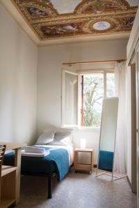Krevet ili kreveti u jedinici u objektu Guest House Villa Angaran San Giuseppe