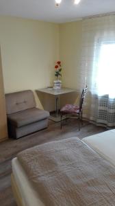 Posezení v ubytování Hotel am Hindenburgplatz