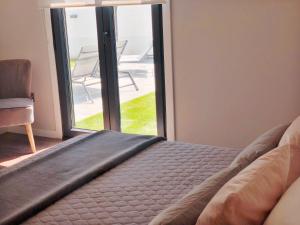 Łóżko lub łóżka w pokoju w obiekcie Chalet Mia Sear Areas