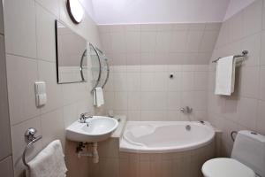 Kúpeľňa v ubytovaní Apartamenty Skaldowie