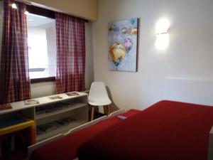 Postel nebo postele na pokoji v ubytování Un Balcon Sur La Mer