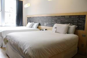 Letto o letti in una camera di TRYP by Wyndham New York City Times Square - Midtown