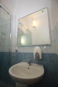 Koupelna v ubytování Guesthouse Veles