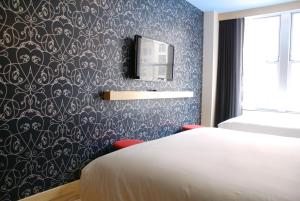 Letto o letti in una camera di TRYP by Wyndham New York City Times Square - Midtown