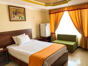 Postel nebo postele na pokoji v ubytování Hotel Somagg + 22 fotografií
