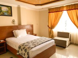 Postel nebo postele na pokoji v ubytování Hotel Somagg