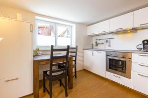 Kuchyň nebo kuchyňský kout v ubytování Ferienhaus Bachschlössle