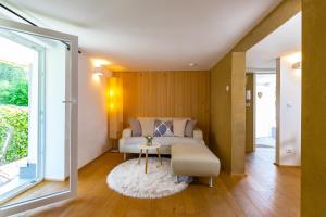Posezení v ubytování Ferienhaus Bachschlössle