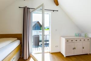Postel nebo postele na pokoji v ubytování Ferienhaus Bachschlössle