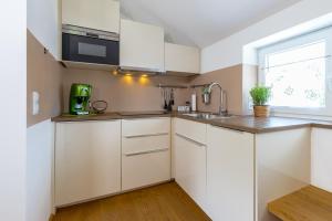 Kuchyň nebo kuchyňský kout v ubytování Ferienhaus Bachschlössle