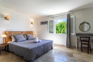 Postel nebo postele na pokoji v ubytování Mas Saint Julien + 37 fotografií