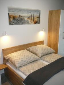 Ein Bett oder Betten in einem Zimmer der Unterkunft Gardenia Mare Baltic Dziwnów