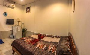 
Ein Bett oder Betten in einem Zimmer der Unterkunft Surada Guesthouse
