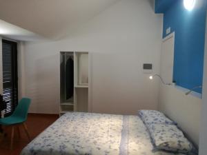 Llit o llits en una habitació de B&B Villa Napoli