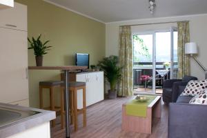 TV a/nebo společenská místnost v ubytování Hölbinger Alm - Apartments + 37 fotografií