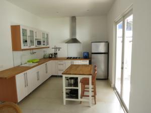 Köök või kööginurk majutusasutuses Tamarindo