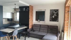 Posedenie v ubytovaní Luksusowy apartament z tarasem