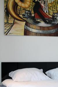 Letto o letti in una camera di Hotel Grey