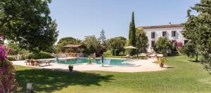 Bazén v ubytování Hacienda las tres niñas nebo v jeho okolí