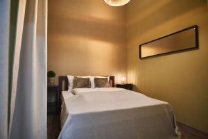 Postel nebo postele na pokoji v ubytování P2 Apartment | Budapest