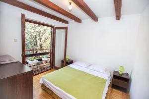 Posteľ alebo postele v izbe v ubytovaní Penthouse Karlobag