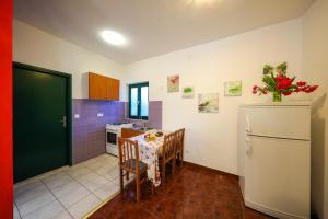 Kuchyň nebo kuchyňský kout v ubytování Apartment Corto
