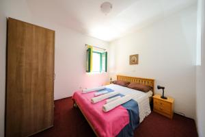 Postel nebo postele na pokoji v ubytování Apartment Corto