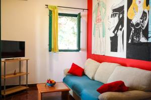TV a/nebo společenská místnost v ubytování Apartment Corto