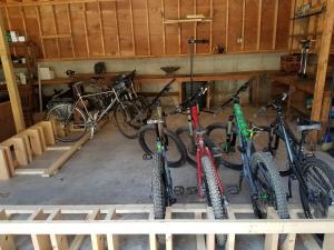 a group of bikes parked in a garage at Turn of River Lodge in Killington