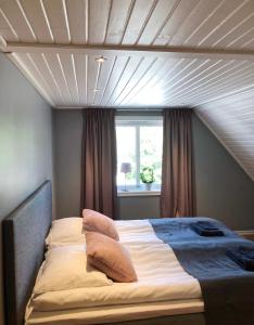 Postel nebo postele na pokoji v ubytování Lindens Bed&Breakfast