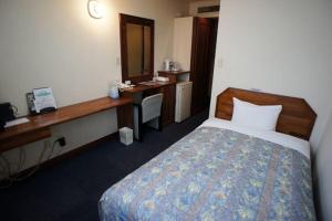 Postel nebo postele na pokoji v ubytování Hotel Sentpia