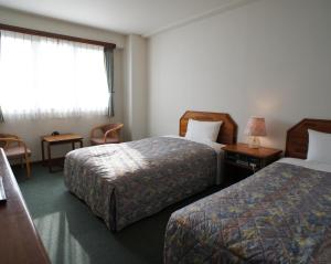 Postel nebo postele na pokoji v ubytování Hotel Sentpia