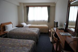 Postel nebo postele na pokoji v ubytování Hotel Sentpia